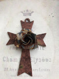 Metal cross with aged rose metal center